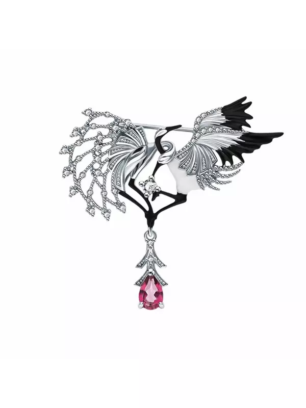 Серебряная брошь с эмалью, фианитами и топазами